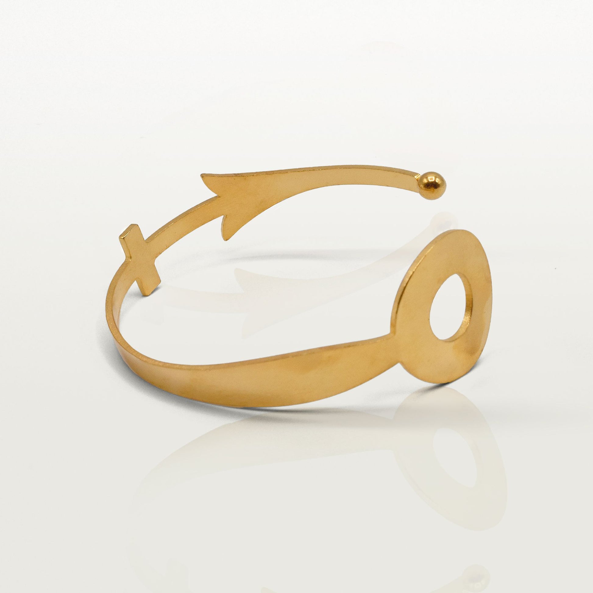 Manchette Fêtes fabriquée à Paris par Marie-Louise Orlach. Dorée à l'or fin.