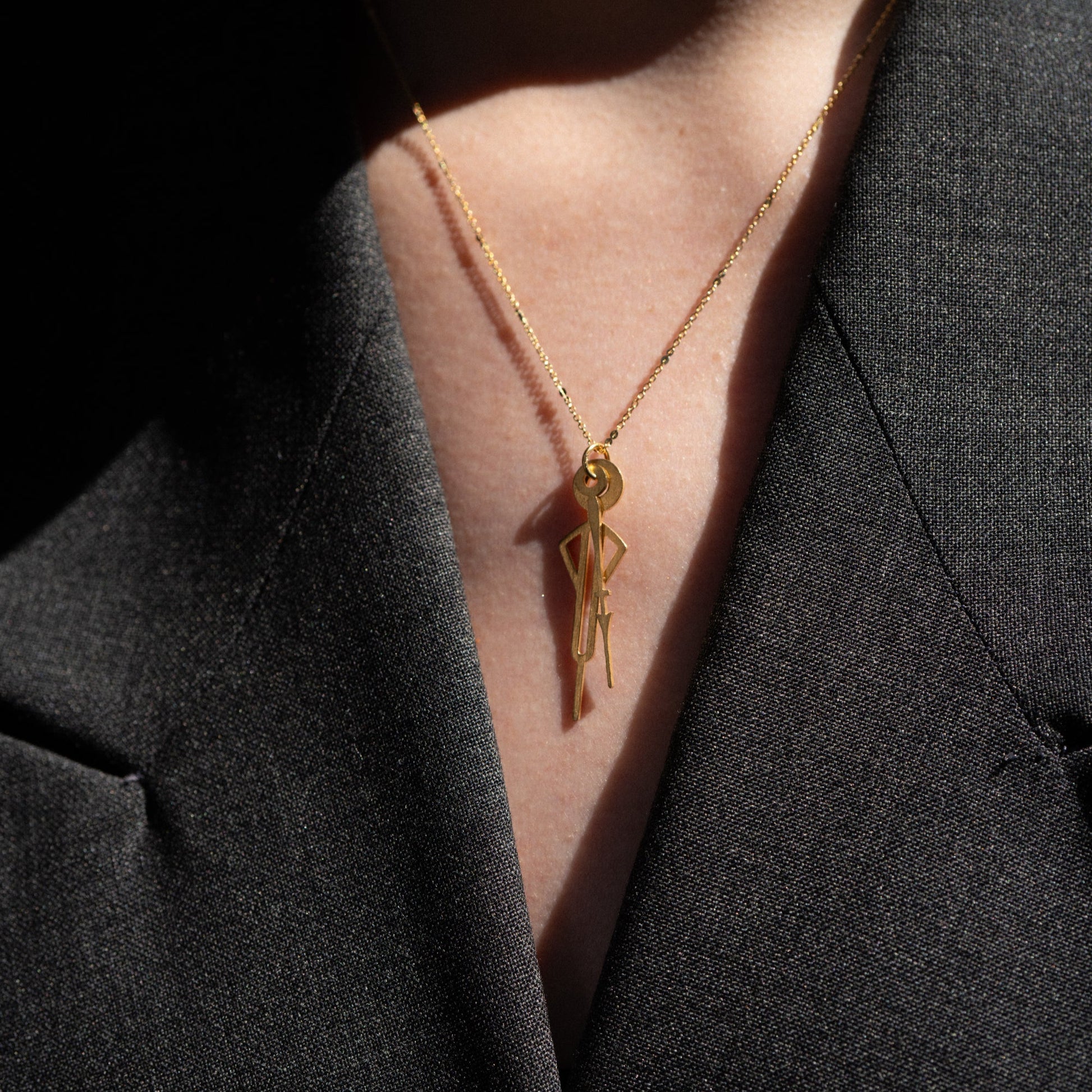 Collier Silencieuses, doré à l'or fin.